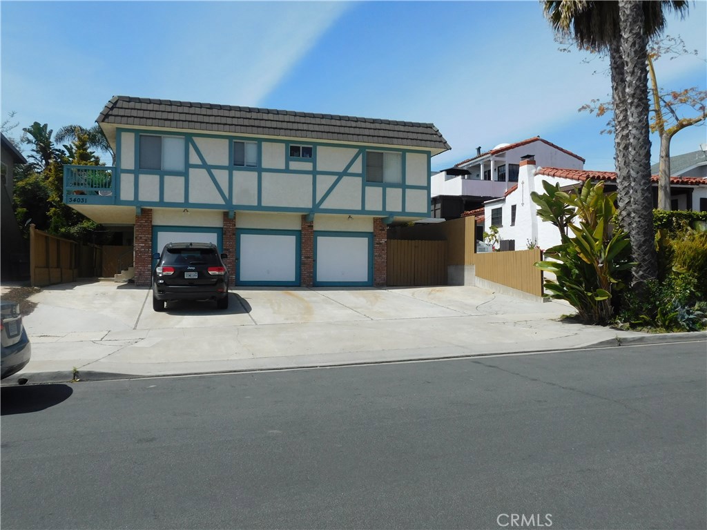 Gorgeous Triplex with tons of parking. All units have a one car garage plus a driveway. There are also 2 extra parking s - 34031 Amber Lantern Street, Dana Point CA 92629 - photo 1