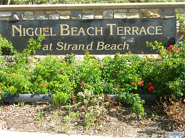 Entrance to the beautiful landscaped common areas - 34042 W SELVA Road 140, Dana Point CA 92629 - photo 1