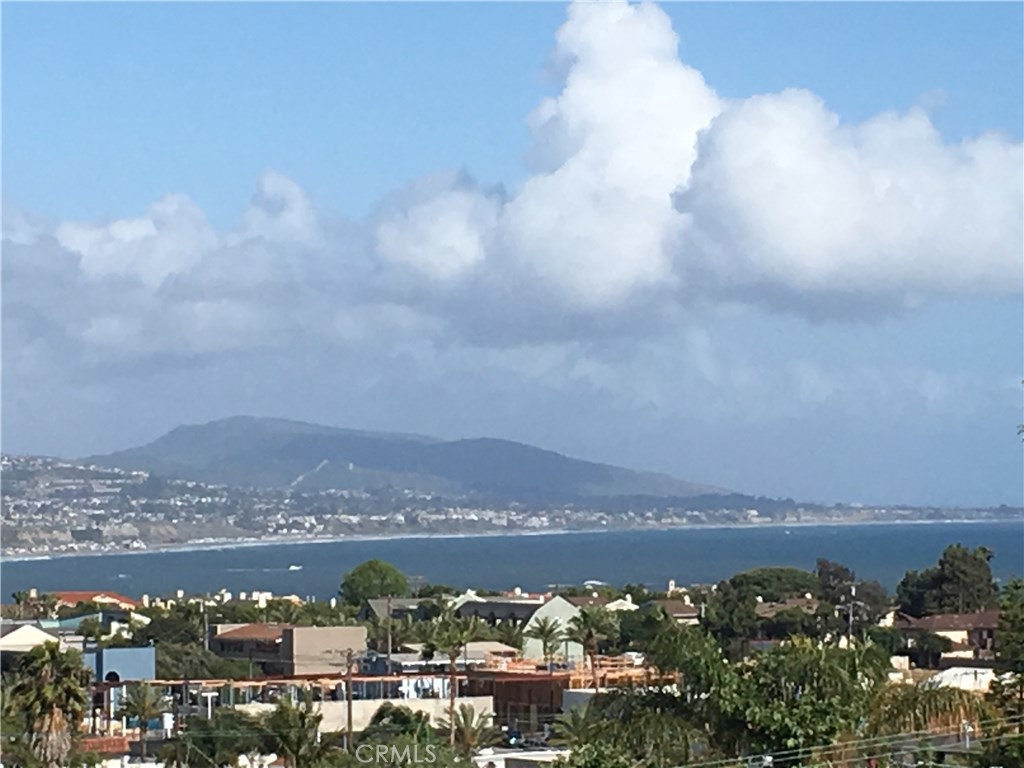OCEAN AND WHITE WATER VIEW FROM TOP DECK - 34051 Ruby Lantern Street, Dana Point CA 92629 - photo 1