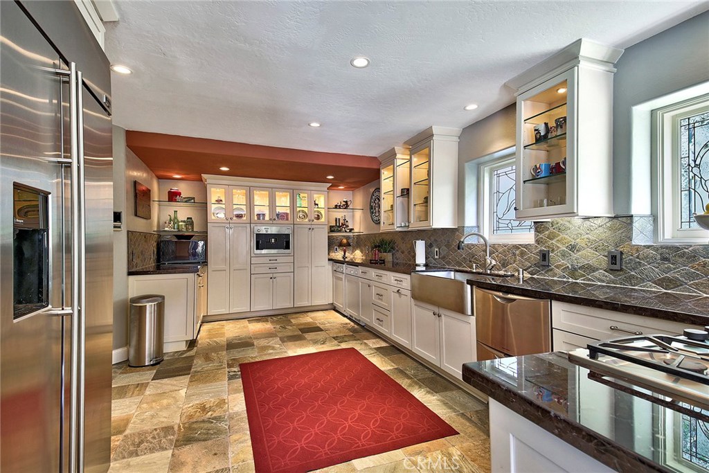 Stunning remodeled kitchen with beautiful cabinetry and custom features! - 34096 Crystal Lantern Street, Dana Point CA 92629 - photo 1