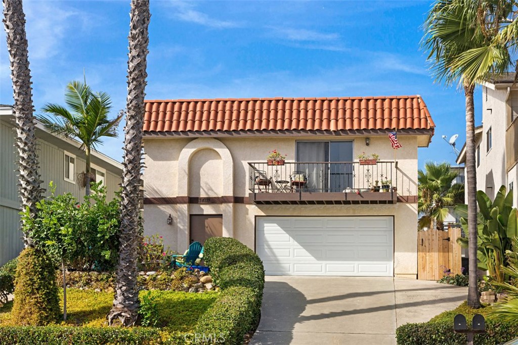 Door shown is unit A. Balcony is for Unit A as well. - 34111 El Encanto Avenue, Dana Point CA 92629 - photo 1