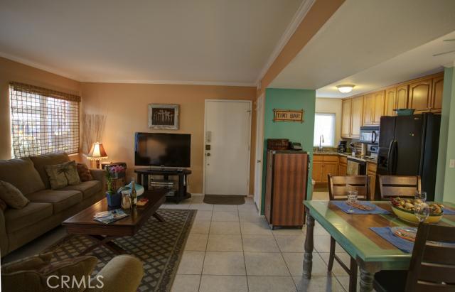 A view of the Living Room, Dining Room and Kitchen. - 34120 Selva Road 282, Dana Point CA 92629 - photo 1
