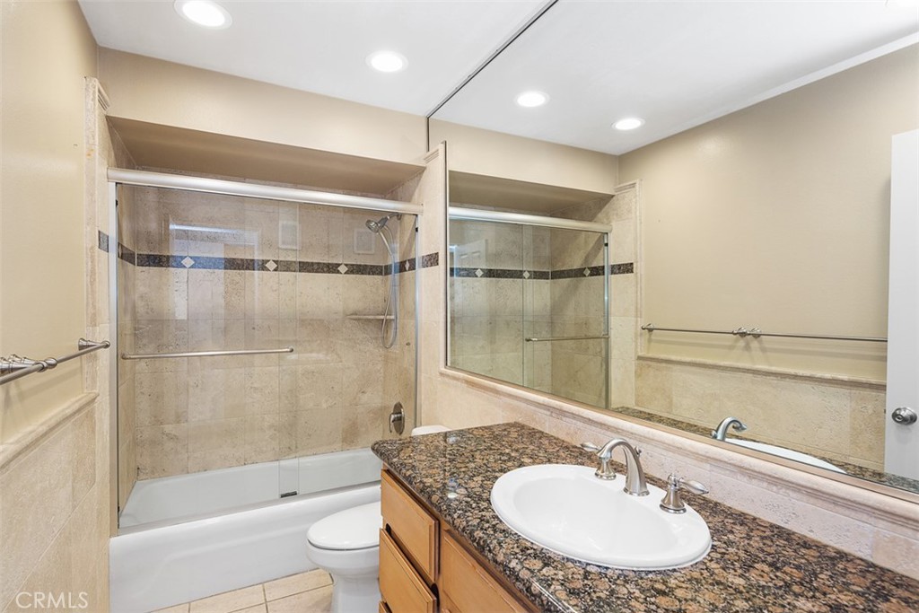 Granite counters. Shower tub with glass enclosure - 34121 Ruby Lantern A, Dana Point CA 92629 - photo 15
