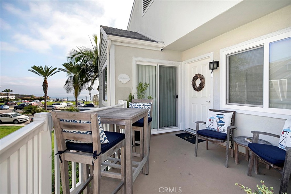 Front patio space to relax and watch sunset. - 34126 Selva Road 301, Dana Point CA 92629 - photo 3