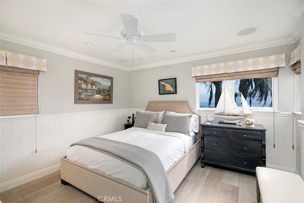 Queen sized bed guest room with own TV. - 34126 Selva Road 301, Dana Point CA 92629 - photo 9
