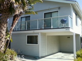 Unit is upstairs on the back side of this building. There is no patio with this unit. - 34152 RUBY LANTERN C, Dana Point CA 92629 - photo 1