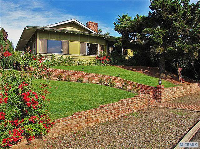 Elevated above the street with large front yard, beautiful brick work and fabulous curb appeal. - 34246 CAMINO EL MOLINO, Dana Point CA 92624 - photo 1