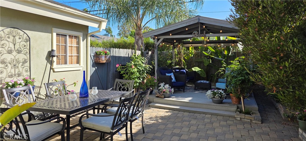 Comfortable relaxing peaceful seating in the beautiful private garden with large patio table and umbrella - 34271 Via Lopez, Dana Point CA 92624 - photo 12
