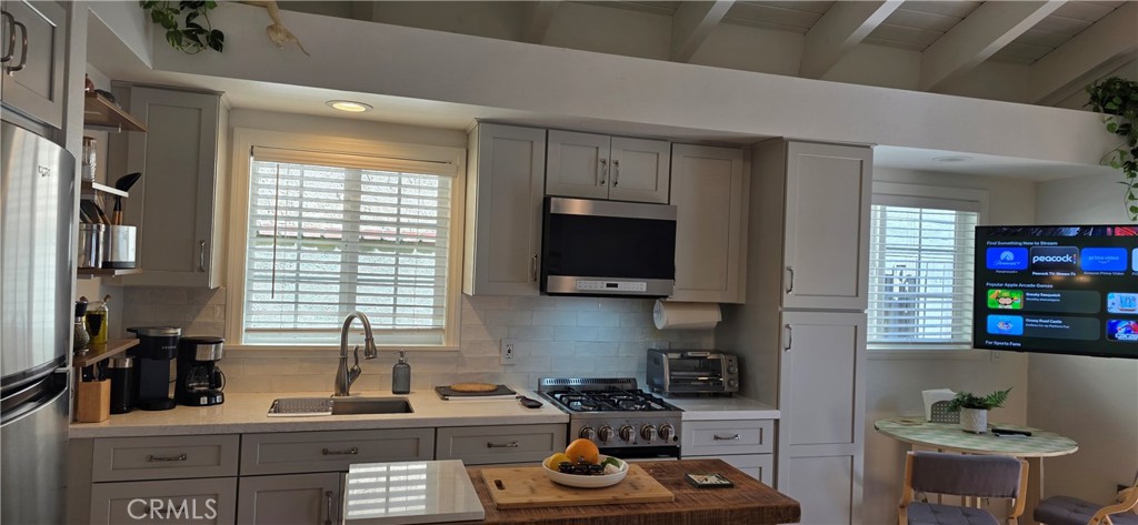ADU Efficient Kitchen with Amenities Center Island. Table and 2 Chairs - 34271 Via Lopez, Dana Point CA 92624 - photo 32