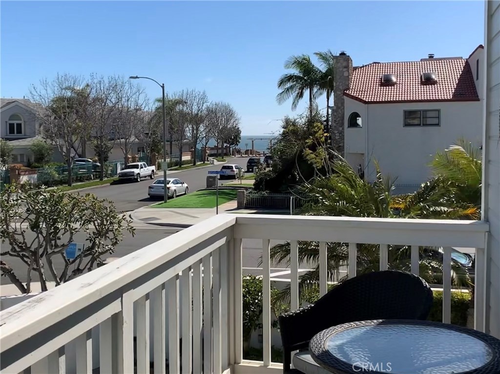 Enjoy an ocean view from the living room deck! You're steps away from the beach, Dana Point Harbor and the restaurants, - 34279 Amber Lantern Street 11, Dana Point CA 92629 - photo 1