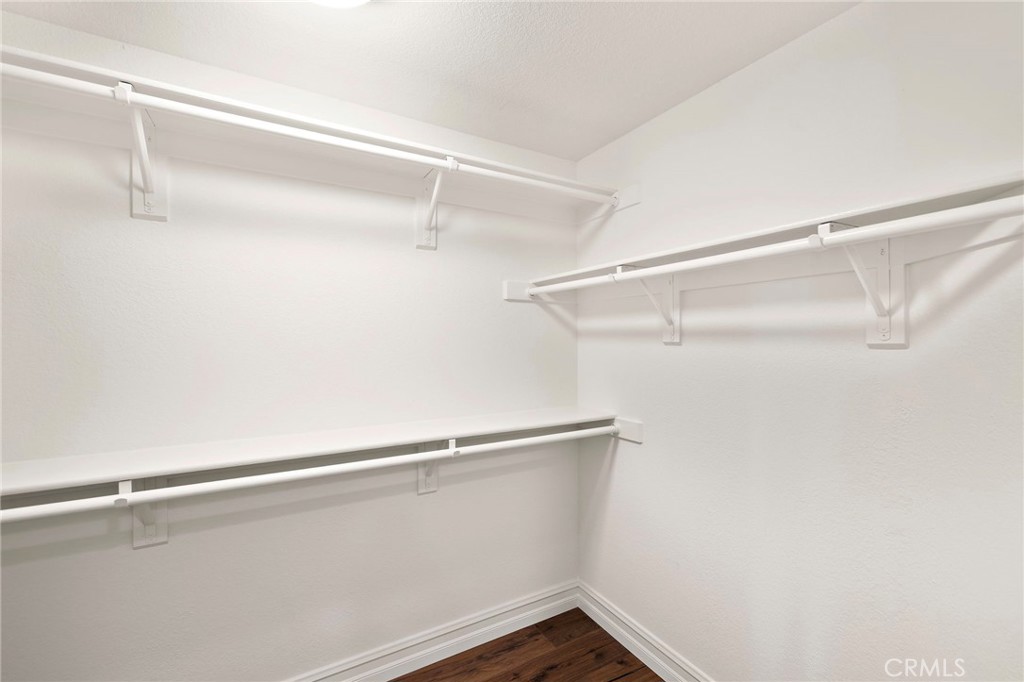 Primary walk-in closet - 34279 Amber Lantern Street 11, Dana Point CA 92629 - photo 25