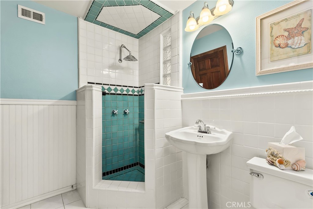 Ole Hanson Tile Design with Step In Shower Downstairs - 34283 Via Lopez, Dana Point CA 92624 - photo 15