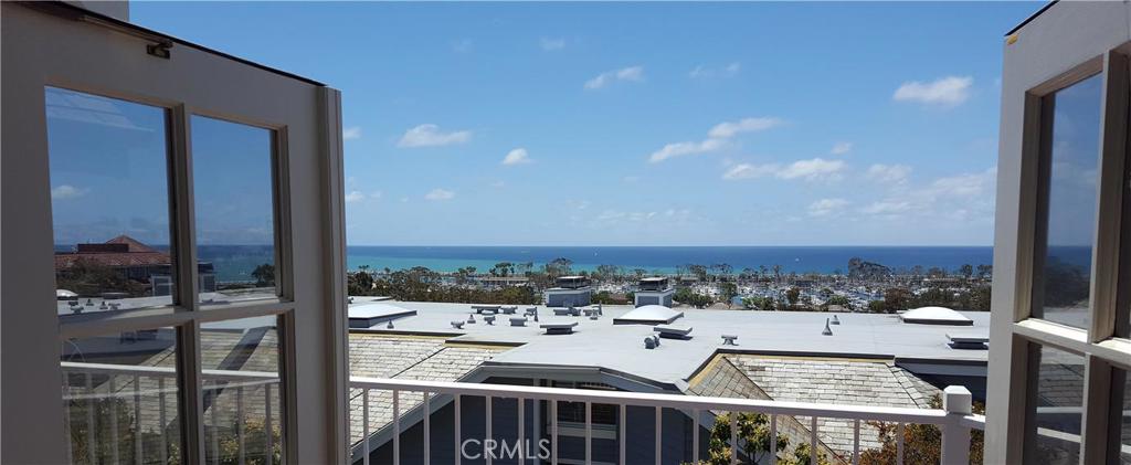 Exit your villa to your full ocean view private deck - 34300 Lantern Bay Drive 108, Dana Point CA 92629 - photo 1
