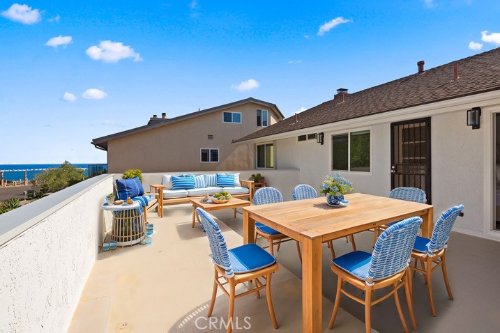 View & Location!! So much deck space here. Y You will live outside!! Set with table for Sunset Gathering. Guest enter th - 34311 Amber Lantern Street, Dana Point CA 92629 - photo 1