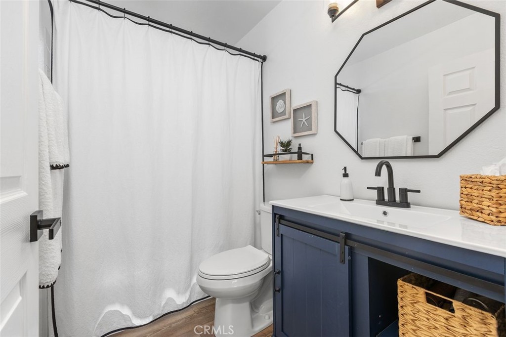 The main bathroom has been updated with tasteful accents. - 34355 Via San Juan, Dana Point CA 92624 - photo 26