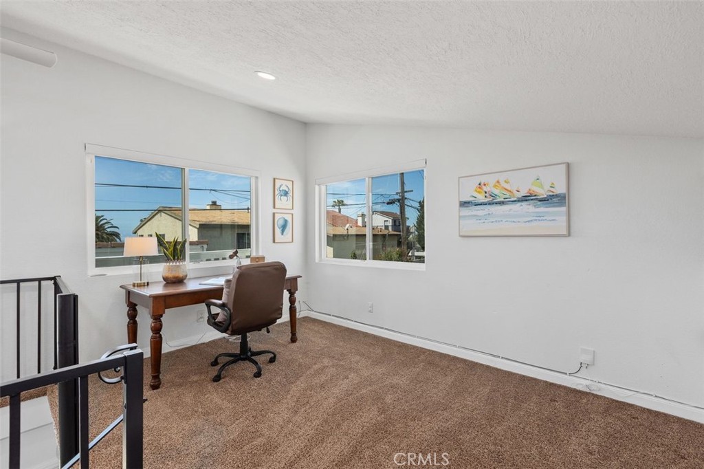 At the top of the spiral staircase is an enormous room. This is just part... - 34355 Via San Juan, Dana Point CA 92624 - photo 32