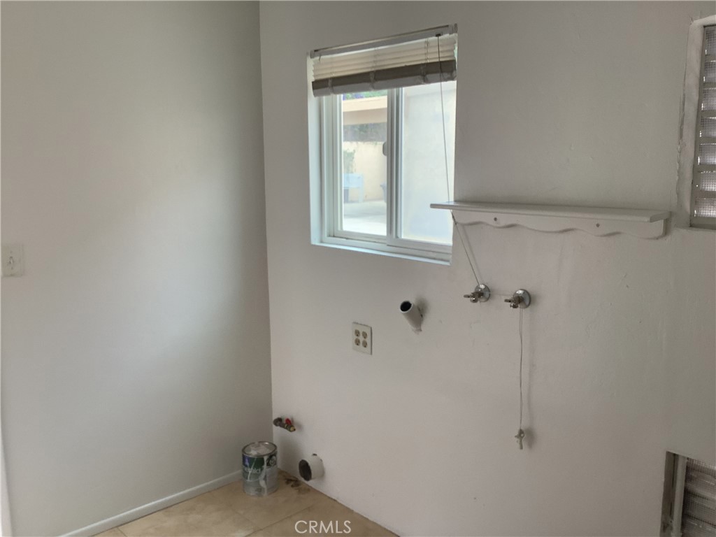 Laundry room with Washer and Dryer Hookups. - 34382 Via San Juan # B, Dana Point CA 92624 - photo 20