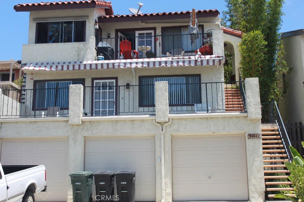 Front view of home... Garages below unit and only one person above - 34442 Via Espinoza, Dana Point CA 92624 - photo 1