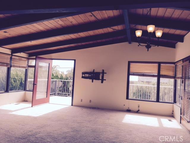 Wide open Great Room with entry to wrap around Deck - 34581 Via Catalina A, Dana Point CA 92624 - photo 1