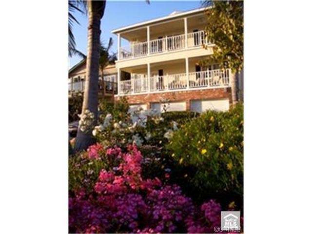 Front floral gardens blooms most of the year. - 34602 Camino Capistrano A, Dana Point CA 92624 - photo 1