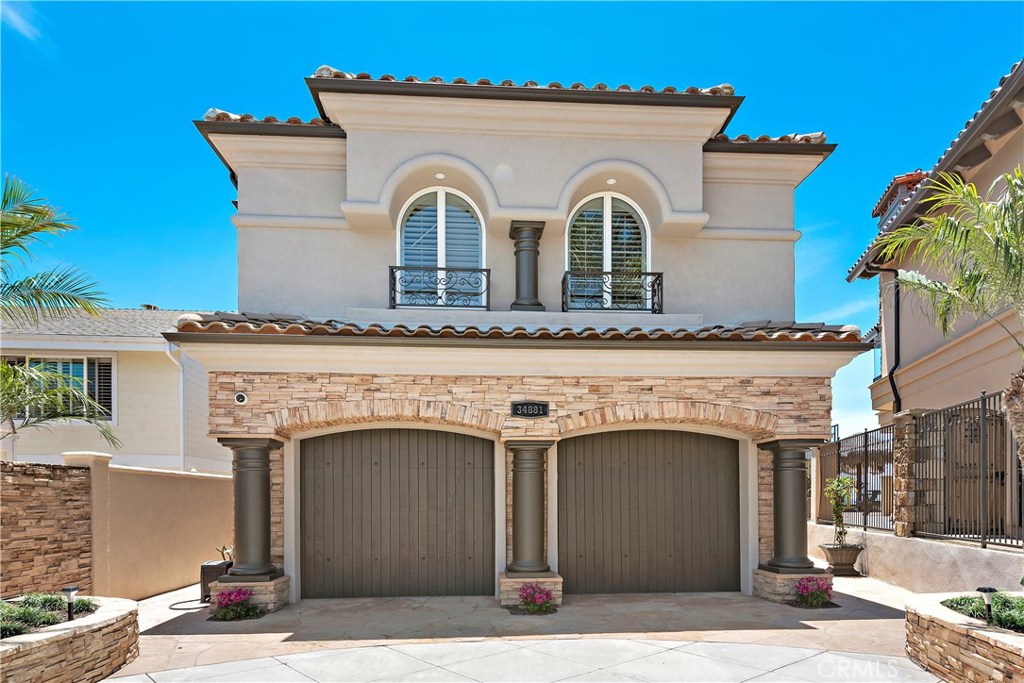 Such a gorgeous home. Freshly painted inside and out, with custom garage doors. Inside the garage there is a car lift fo - 34881 Doheny Place, Dana Point CA 92624 - photo 1