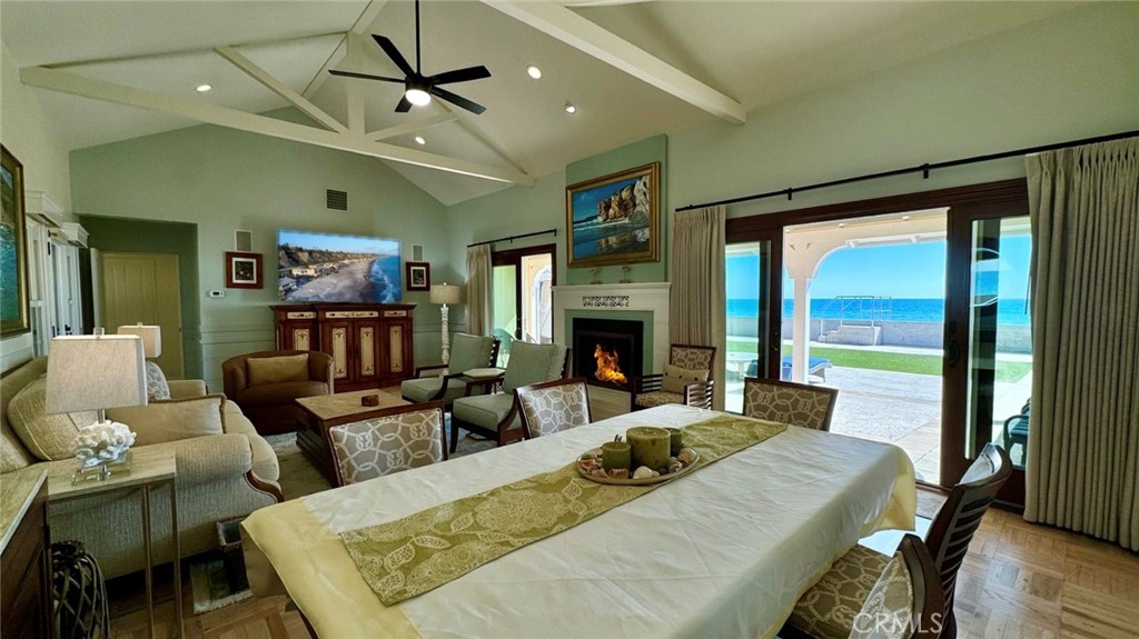 LIVING ROOM OPENS THROUGH 2 SLIDERS TO OUTDOOR PATIO - 35225 Beach Road, Dana Point CA 92624 - photo 1