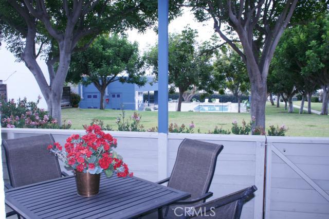 Large Patio with Relaxing Setting...Looking Over Parklike Grounds, Association Pool and Spa - 35256 Camino Capistrano 17, Dana Point CA 92624 - photo 1