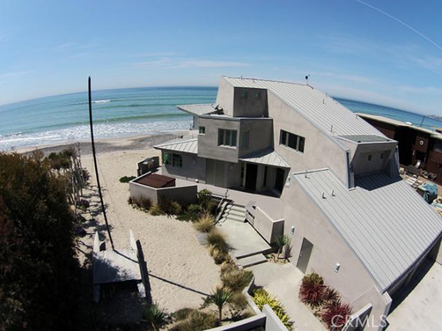 VERY PRIVATE HOME LOCATED DIRECTLY ON THE SAND WITH RENOWN POCHE SURF BREAK OUT FRONT. - 35827 Beach Road, Dana Point CA 92624 - photo 1