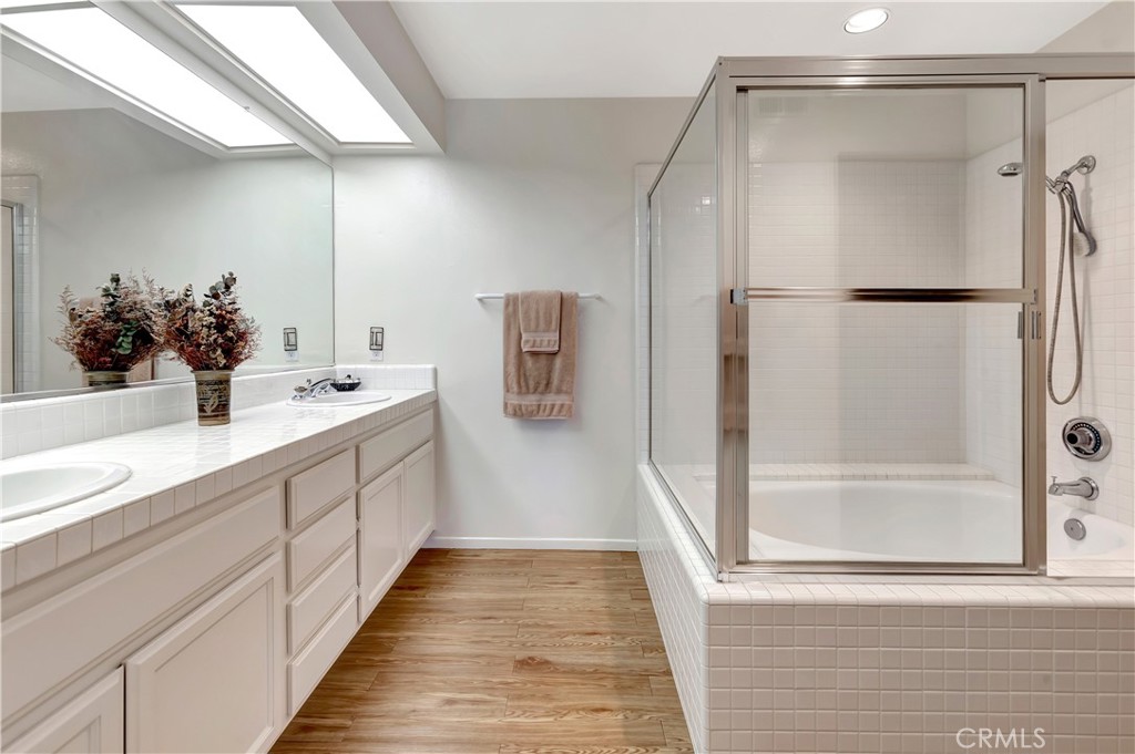 large bathroom with dual sinks and bathtub - 4 Vista Del Mar, Dana Point CA 92629 - photo 5