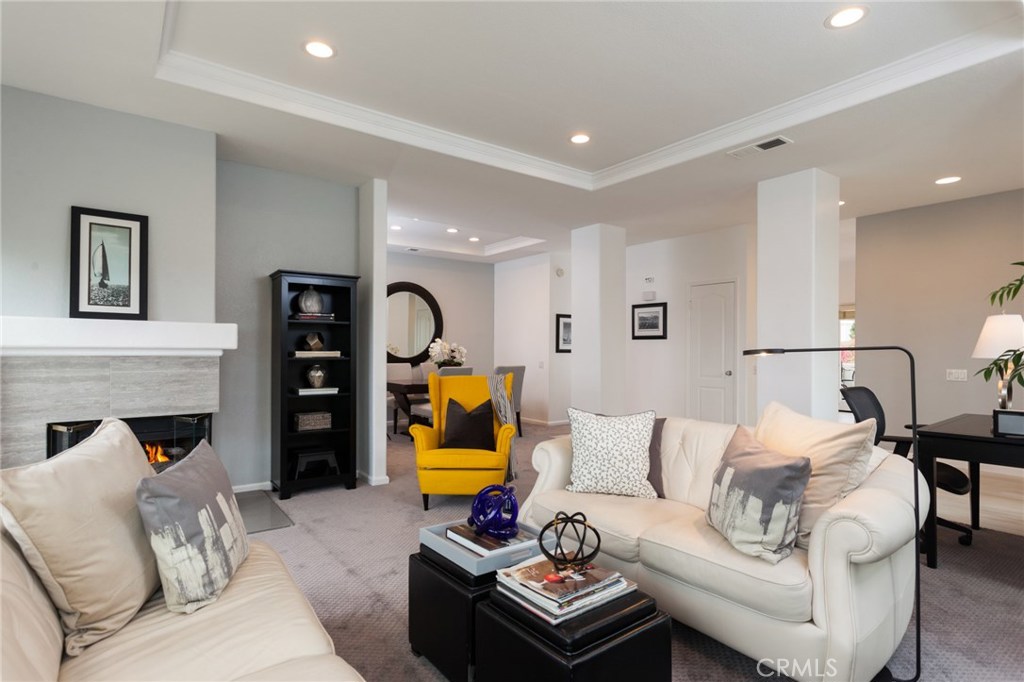 Great room with fireplace and ocean view - 41 Centre Court, Dana Point CA 92629 - photo 1