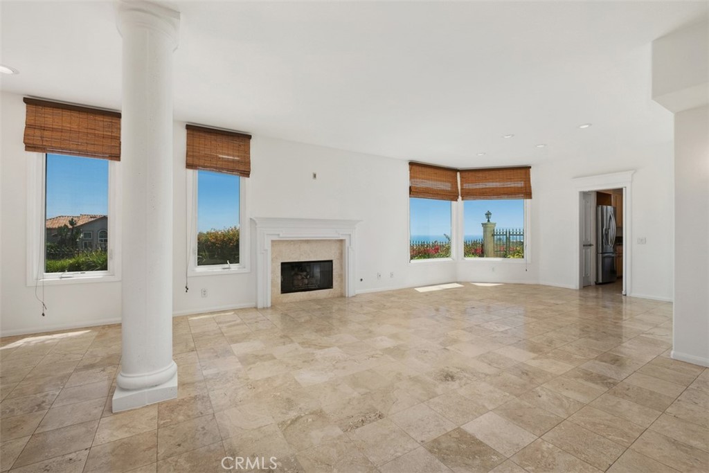 Living room shares open concept floor plan with dining room - all framed by ocean-view picture windows - 41 Costa Del Sol, Dana Point CA 92629 - photo 9