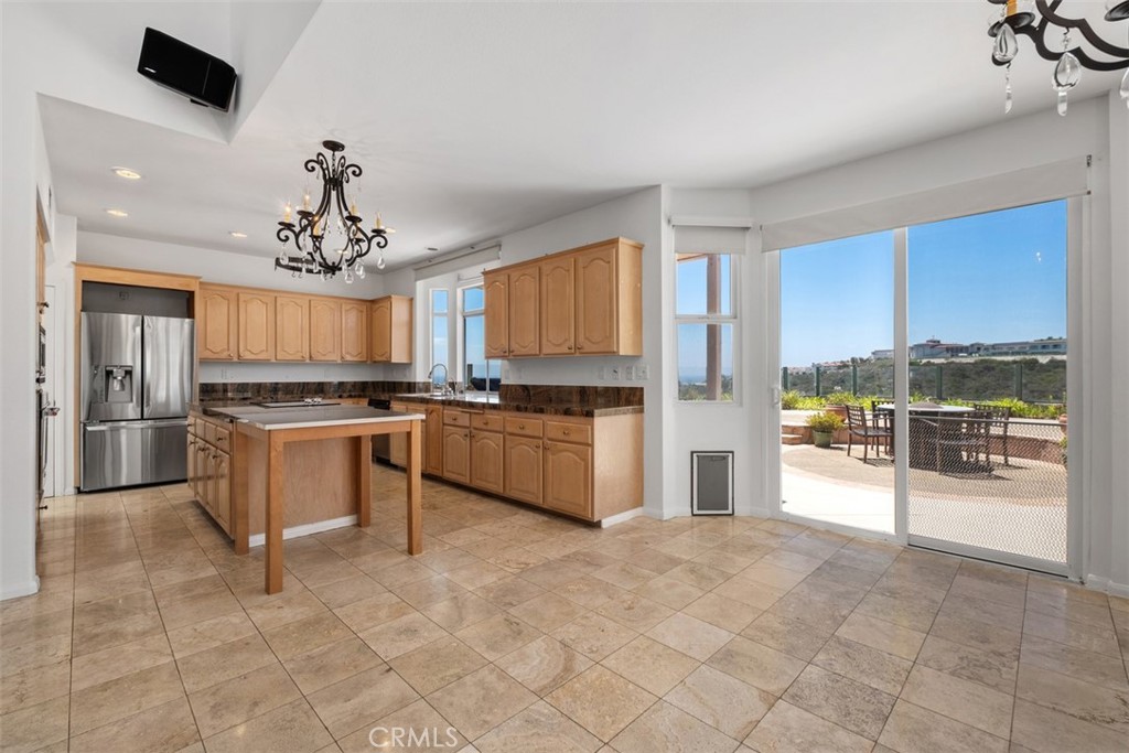 Chefs kitchen with ocean views and direct access to your private patio - 41 Costa Del Sol, Dana Point CA 92629 - photo 11