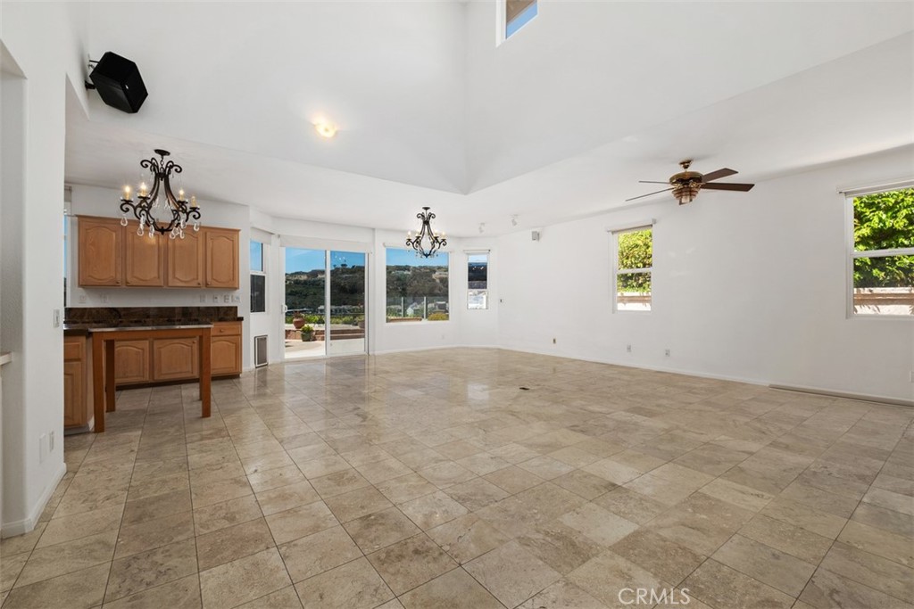 Expanded living room opens effortless into the kitchen - 41 Costa Del Sol, Dana Point CA 92629 - photo 12