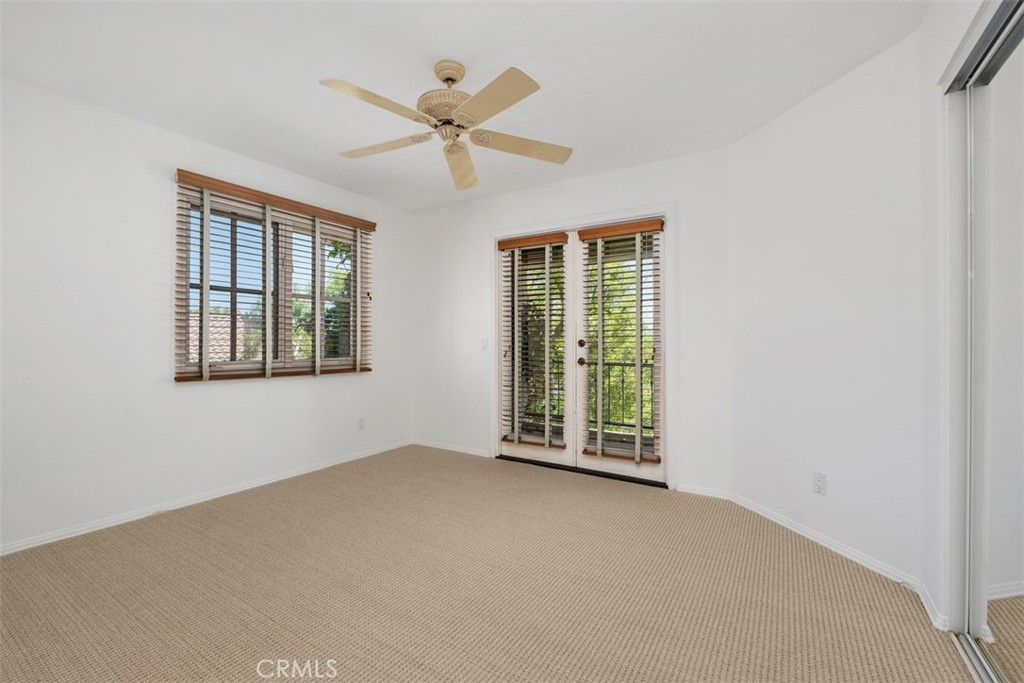 Upstairs secondary bedroom with new carpet and private ocean-view balcony - 41 Costa Del Sol, Dana Point CA 92629 - photo 25