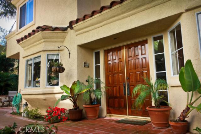 Immaculate courtyard entry with double doors and custom waterfall directly across from front door! - 42 Saint John, Dana Point CA 92629 - photo 1