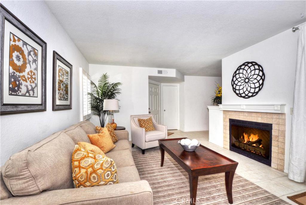 Living Room w/Fireplace - 54 Corniche C, Dana Point CA 92629 - photo 1