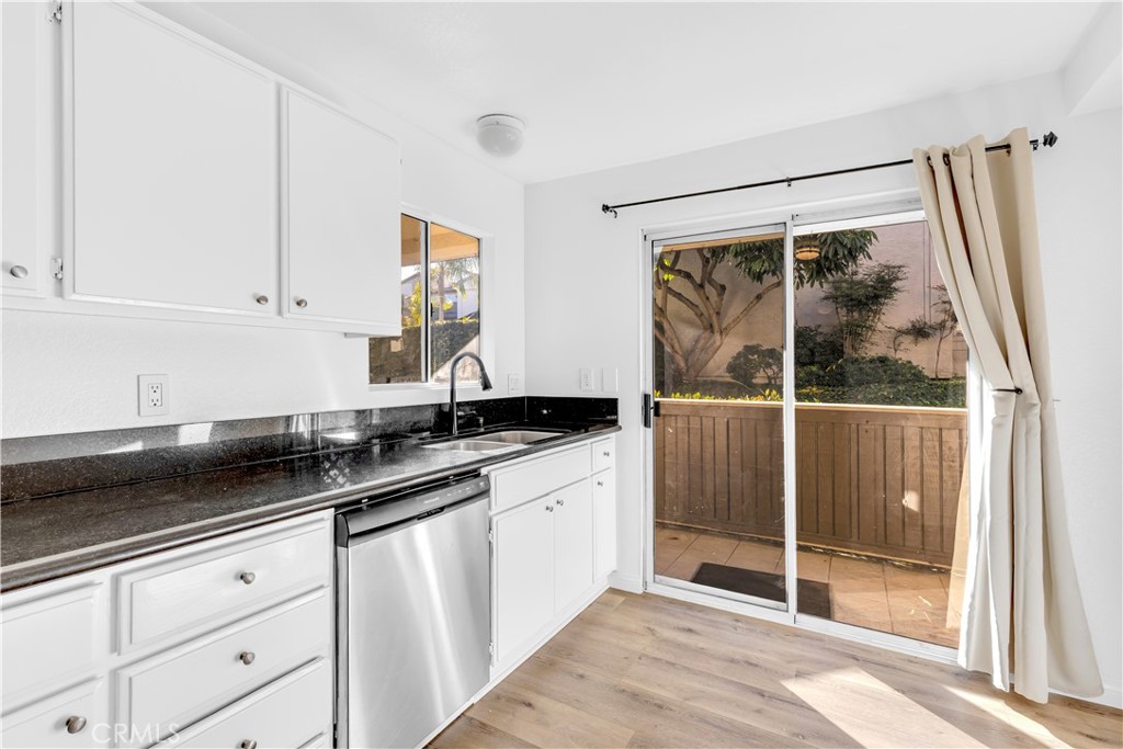 Bright sunny kitchen will dare you not to smile while cooking here. - 56 Corniche D, Dana Point CA 92629 - photo 1