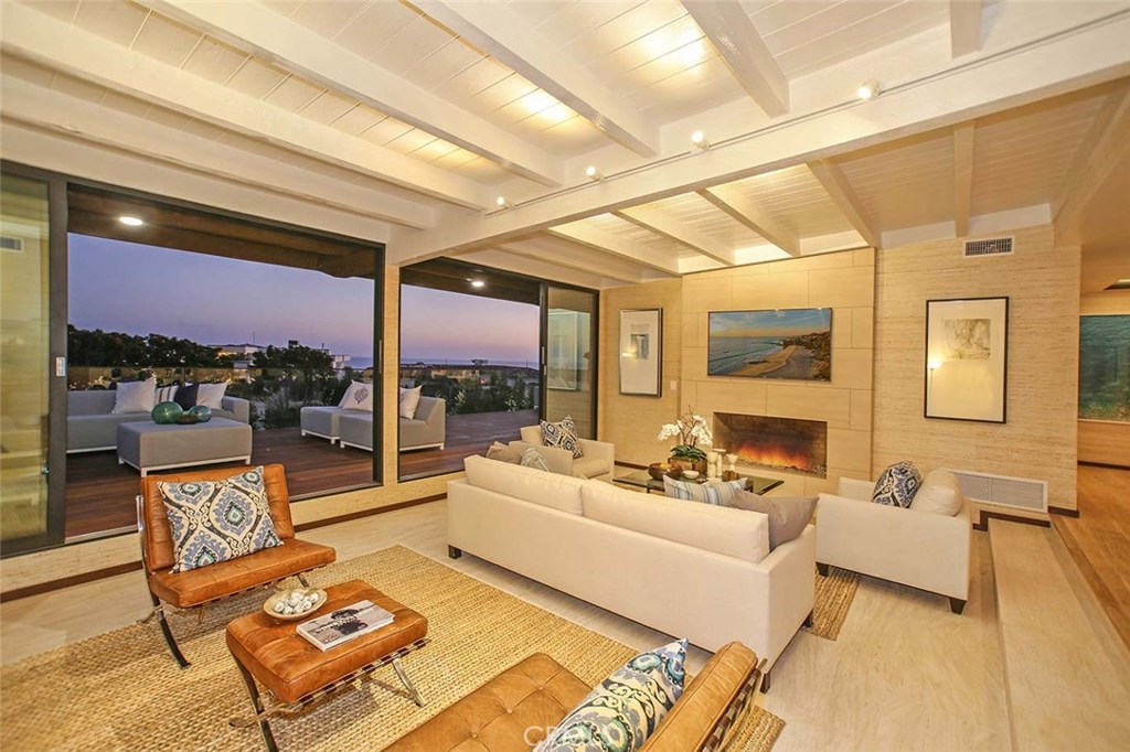 Great Room-Sliding Doors Open entire front of the home to the Ocean View Deck - 56 Monarch Bay Drive, Dana Point CA 92629 - photo 1