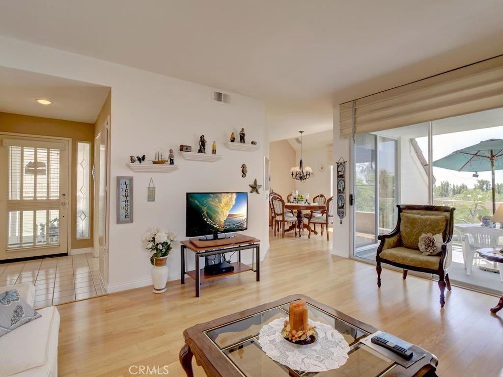 Open floor plan with tree lined view and an abundance of natural light. - 58 Terra Vista, Dana Point CA 92629 - photo 1