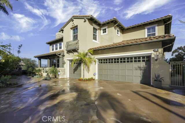 This semi custom estate, with it's long and private driveway, is on one of the most private corner lots in the Bal Harbo - 6 Lapis Avenue, Dana Point CA 92629 - photo 1