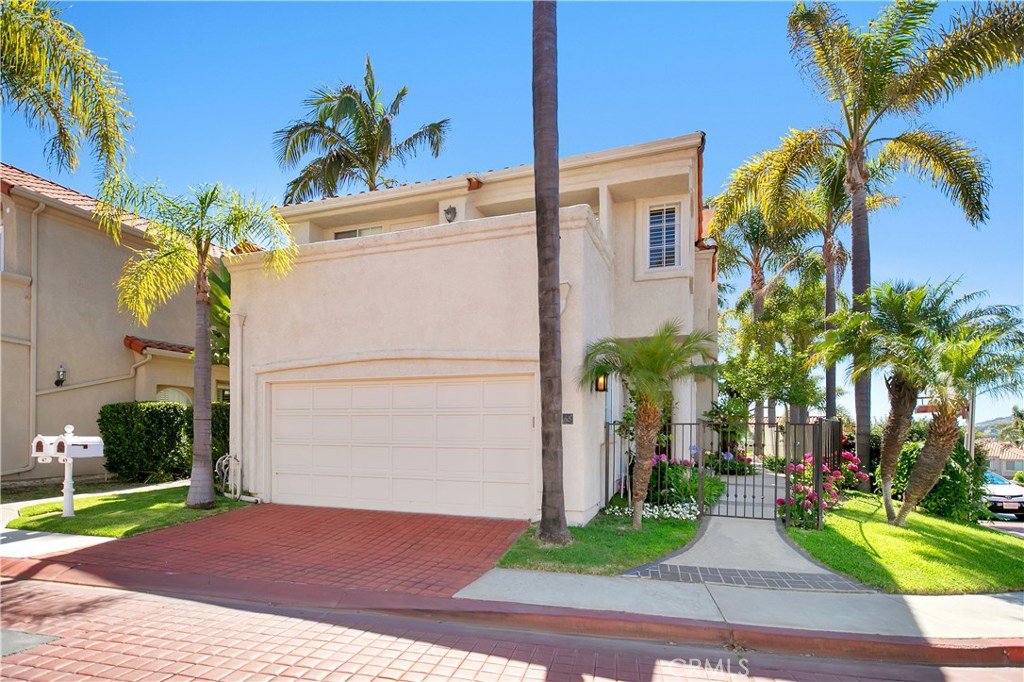 Beautiful corner lot with lush palm trees and gated entry. - 65 Saint Michael, Dana Point CA 92629 - photo 1