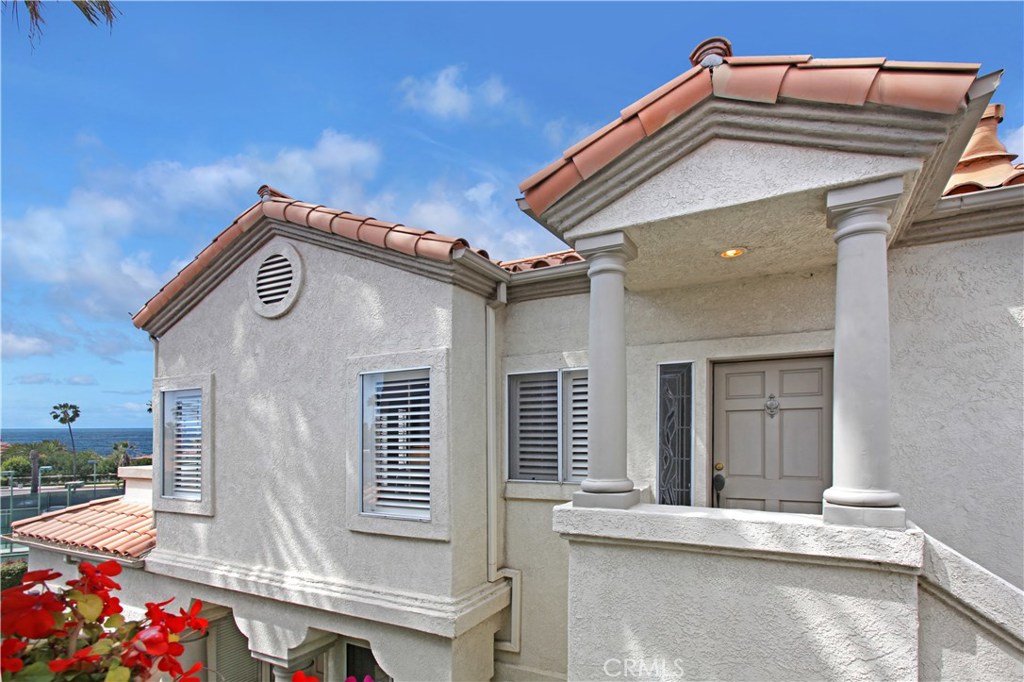 Beautiful views from this upstairs condo in a great location in Tennis Villas. - 7 Centre Court, Dana Point CA 92629 - photo 1