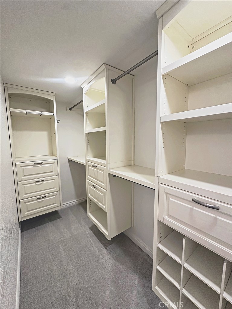 Walk-in closet in primary bedroom - 70 Corniche, Dana Point CA 92629 - photo 12