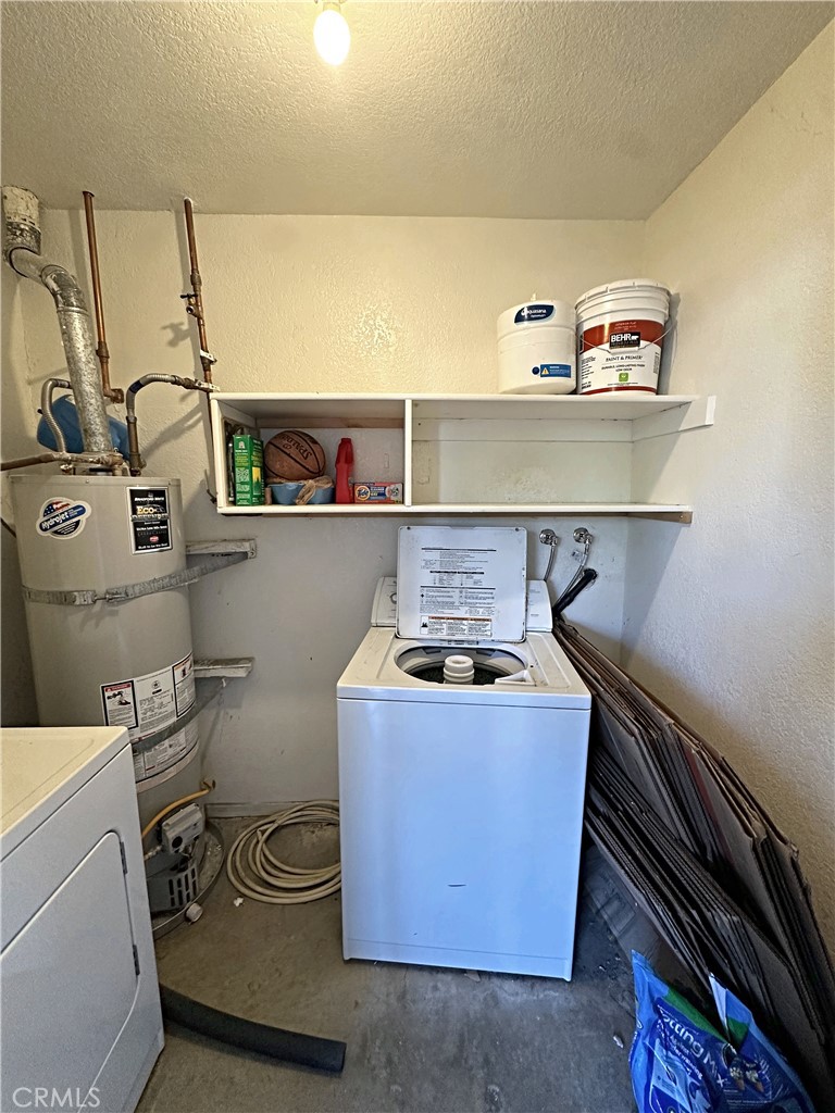 Laundry room with extra storage - 70 Corniche, Dana Point CA 92629 - photo 17