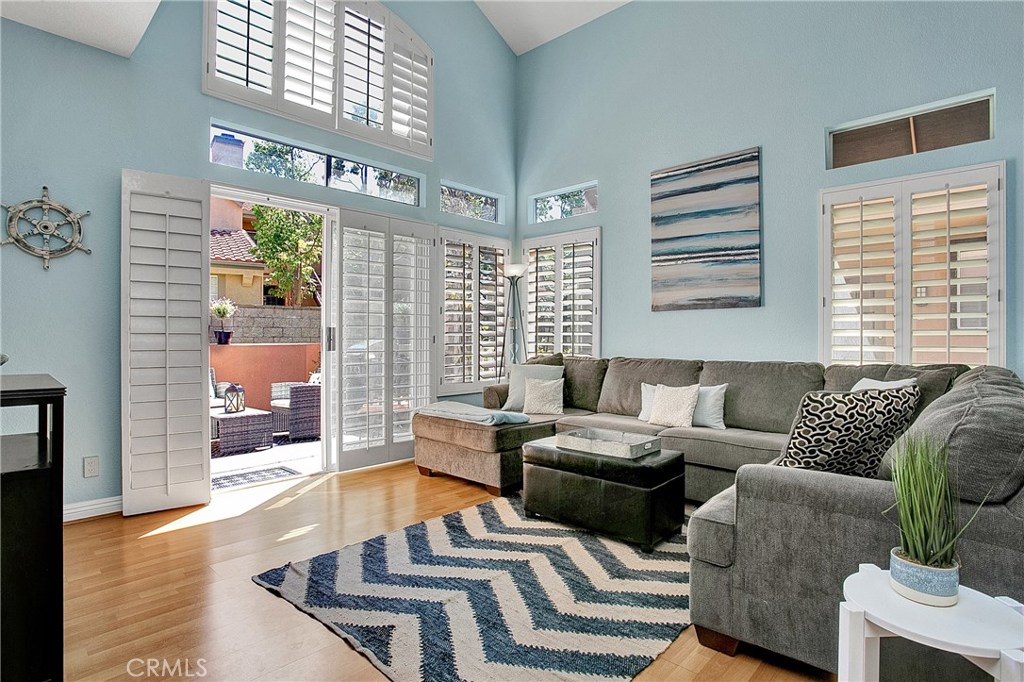 You will love the sunlight that fills the room from the multiple windows with plantation shutters. - 8 Bright Water Drive, Dana Point CA 92629 - photo 1