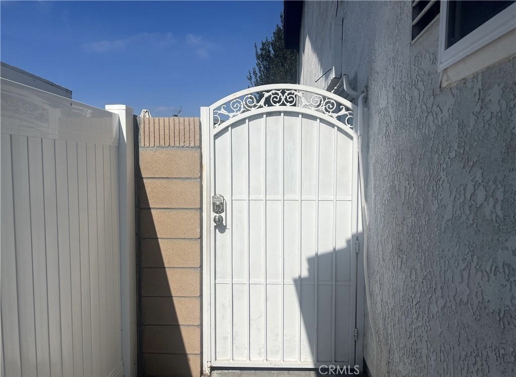 Enter on Left side Gate - 10485 La Sombra Avenue, Fountain Valley CA 92708 - photo 3
