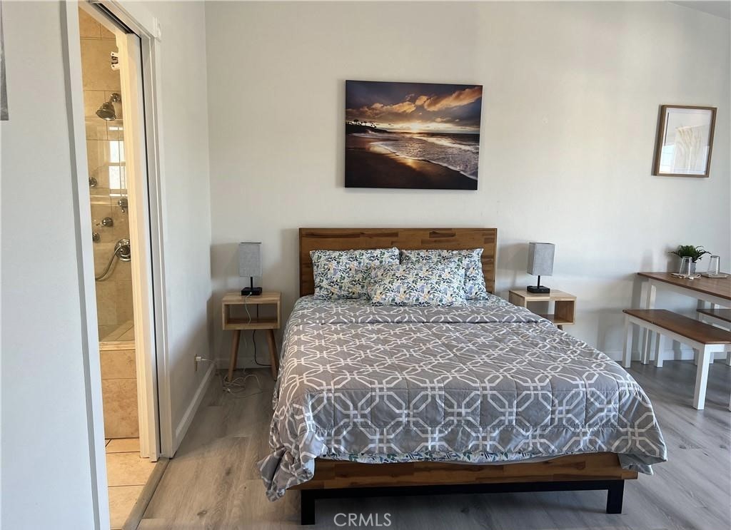 Bed, nightstands, Wall mounted TV - 10485 La Sombra Avenue, Fountain Valley CA 92708 - photo 10