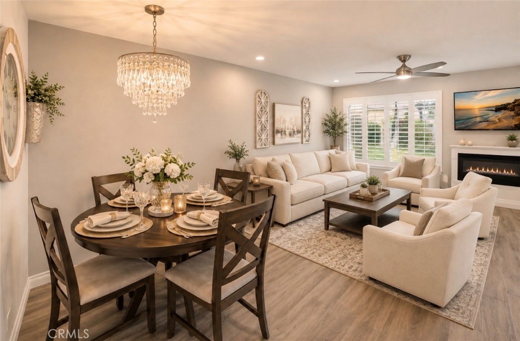 AI enhance photo - Dining room & living room - 10815 Onyx Court, Fountain Valley CA 92708 - photo 1