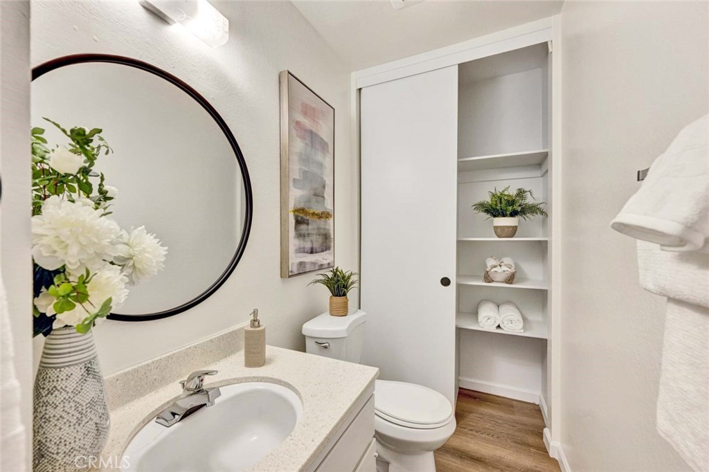 1/2 bath off primary - 11886 Geode, Fountain Valley CA 92708 - photo 15