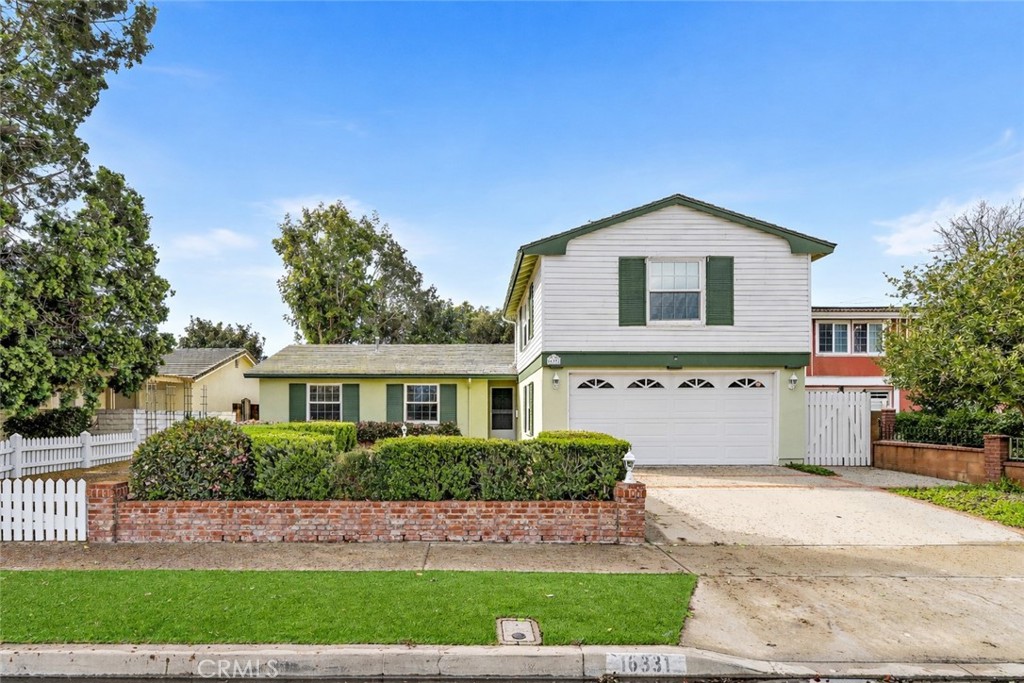 stunning curb appeal feels like a private park - 16331 Mahogany Street, Fountain Valley CA 92708 - photo 1